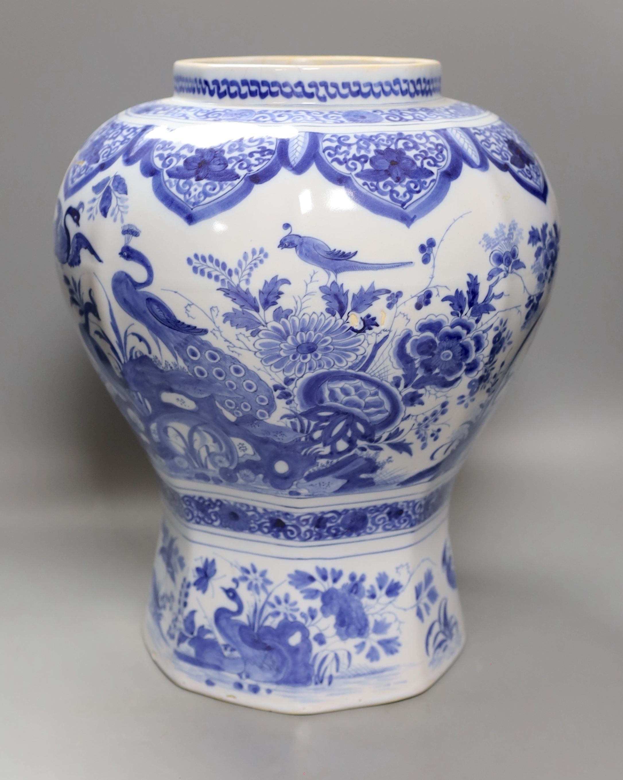 A large blue and white Delft vase, 44 cms high.